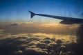 Cloud Window seat airplane concept. Sky cloud view from Seat airplane close up window on sunset or sunrise beautiful. Royalty Free Stock Photo