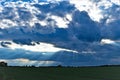 Cloudburst and sun rays over Sprotbrough Fields, South Yorkshire.