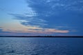 Clouded sunset over Shawano Lake Wisconsin.