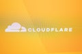 The Cloudflare logo and website interface displayed on a computer screen. Royalty Free Stock Photo