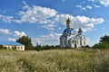 Clouds above the church on the hill Royalty Free Stock Photo