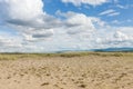 Clouds above the sandy plain near Mongolia. Tyva. Steppe. Sunny summer day Royalty Free Stock Photo