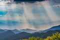 Clouds Above Sun Rays Shining on the Blue Ridge Mountains