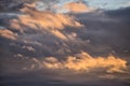 Clouds against the sunset sky. Stormy sky. Royalty Free Stock Photo