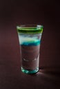 Clouds Alcoholic shot glass with absent, sambuca, tequila, blue Royalty Free Stock Photo