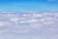 Clouds background with blue sky from above. View from airplane window Royalty Free Stock Photo