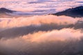 Clouds bathed in the sunset light covering rolling hills, south San Francisco bay area, California Royalty Free Stock Photo