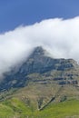 Clouds blow over Table Mountain and mountains behind Cape Town, South Africa Royalty Free Stock Photo