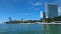 Clouds on blue sky with high skyscrapers buildings and ocean background wallpaper,