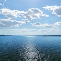 Clouds in blue sky over river Royalty Free Stock Photo