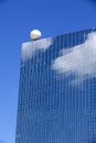 Clouds and blue sky reflection in the glass of skyscraper Royalty Free Stock Photo