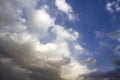 Clouds in the blue sky. A stunning gray sky. The storm is approaching. A beautiful clouds against the blue sky background. Amazing Royalty Free Stock Photo