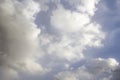 Clouds in the blue sky. A stunning gray sky. The storm is approaching. A beautiful clouds against the blue sky background. Amazing Royalty Free Stock Photo