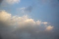 Clouds in the blue sky. A stunning gray sky. The storm is approaching. A beautiful clouds against the blue sky background. Amazing Royalty Free Stock Photo