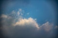 Clouds in the blue sky. A stunning gray sky. The storm is approaching. A beautiful clouds against the blue sky background. Amazing Royalty Free Stock Photo