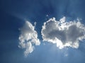 Clouds in blue sky with sun rays Royalty Free Stock Photo