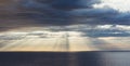 Clouds blue sky and sunlight sunset on horizon ocean . ÃÂ¡loudscape on background seascape dramatic atmosphere rays sunrise