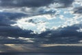 Clouds blue sky and sunlight sunset on horizon ocean. ÃÂ¡loudscape on background seascape dramatic atmosphere rays sunrise. Relax Royalty Free Stock Photo