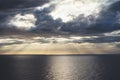 Clouds blue sky and sunlight sunset on horizon ocean . ÃÂ¡loudscape on background seascape dramatic atmosphere rays sunrise. Relax Royalty Free Stock Photo