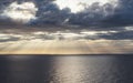 Clouds blue sky and sunlight sunset on horizon ocean . ÃÂ¡loudscape on background seascape dramatic atmosphere rays sunrise. Relax Royalty Free Stock Photo