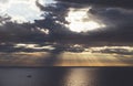 Clouds blue sky and sunlight sunset on horizon ocean . ÃÂ¡loudscape on background seascape dramatic atmosphere rays sunrise. Relax