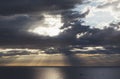 Clouds blue sky and sunlight sunset on horizon ocean . ÃÂ¡loudscape on background seascape dramatic atmosphere rays sunrise. Relax