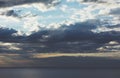 Clouds blue sky and sunlight sunset on horizon ocean. ÃÂ¡loudscape on background seascape dramatic atmosphere rays sunrise. Relax Royalty Free Stock Photo