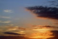 Clouds colored by setting sun on summer evening Royalty Free Stock Photo
