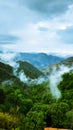 Clouds coming down over a beautiful valley Royalty Free Stock Photo