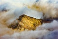 Clouds cover the mountain tops.