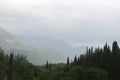 Clouds cover the mountains