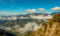 Clouds cover the mountains little