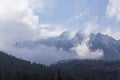 Clouds covering Caraiman mountain peak