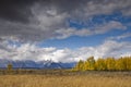 Clouds coving the sky above the Teton Mountain Range in the Fall