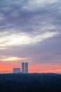 Clouds in dawn sky over city park and towers Royalty Free Stock Photo