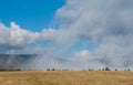 Clouds descending on the field Royalty Free Stock Photo