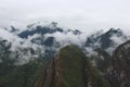 Clouds descending upon the mountain peaks of the Andes, the Vilcabamba range, in the Machupicchu District of Peru Royalty Free Stock Photo