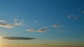 Clouds in different shades. Clouds during sunset. Panoramic view. Timelapse. Royalty Free Stock Photo