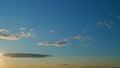 Clouds in different shades. Clouds during sunset. Panoramic view. Timelapse. Royalty Free Stock Photo