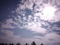 Clouds drifting past the moon