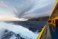 Clouds at dusk at sea from cruise ship railing. Royalty Free Stock Photo