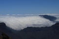 Clouds fall down over the mountain ridge of Cumbre Nueva Royalty Free Stock Photo