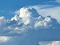 Large White Clouds Float Across the Sky like Ice Burgs in the Sea! Royalty Free Stock Photo