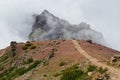 Clouds flowing over mountain at Madeira Island, Portugal, Mountain peak Pico do Arieiro