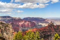 Clouds Fly Over the Red Sandstone Rocks of the Grand Canyon in Arizona Royalty Free Stock Photo