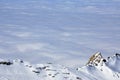 Clouds and fog above, winter landscape in the Alps Royalty Free Stock Photo