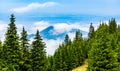 Clouds and fog covered mountain peak