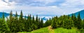 Clouds and fog covered mountain peak panortama