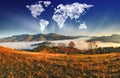 clouds in the form of a map of the world over the mountains. autumn dawn in the Carpathians