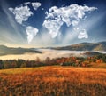 clouds in the form of a map of the world over the mountains. autumn dawn in the Carpathians